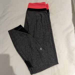 LULU LEMON GREY LEGGINGS WITH ZIPPER FRONT DETAILING AND ORANGE WAISTBAND SIZE 4